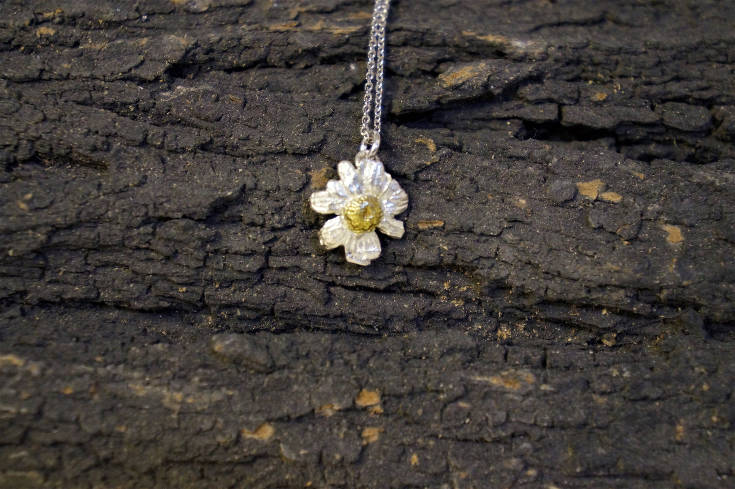 Black mini chamomile flower pendant.Sterling silver minimalist necklace ,14K Goldplated.