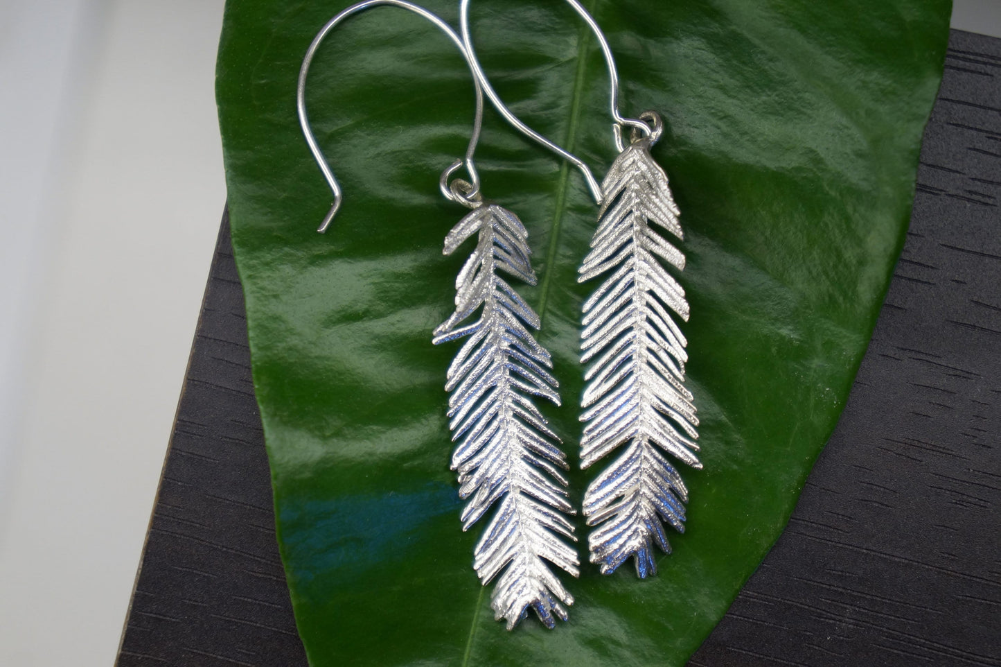 Leaf Earrings on  sterling silver mimosa pudica plant leaves.