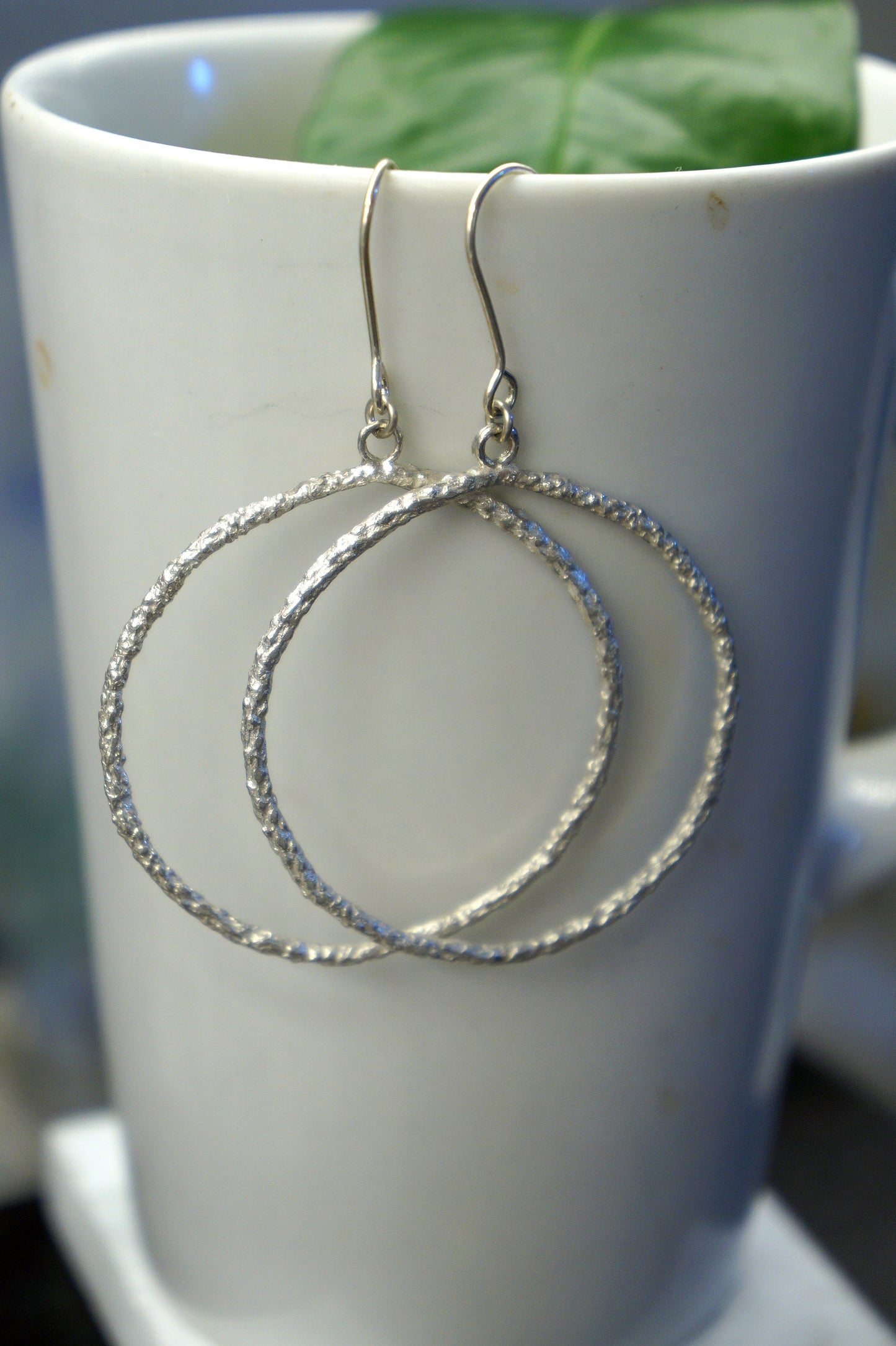 Nature hoop earrings in Sterling Silver.