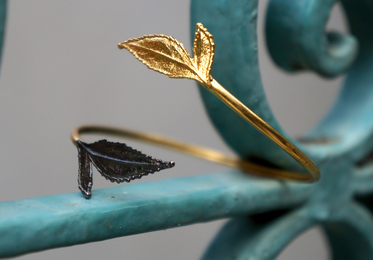 14K Gold plated and Black Rhodium on Sterling Silver leaf cuff bracelet. Roses are ancient symbols of Love and Beauty