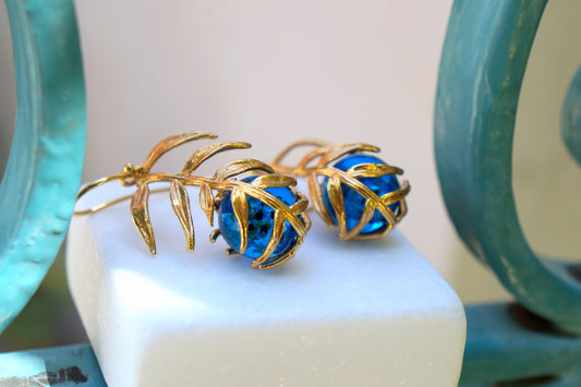 Statement Unique Earrings for Women.  Araucaria Leaf 14k Gold on sterling Silver and Blue Murano inside. Plant earrings by Mother Nature