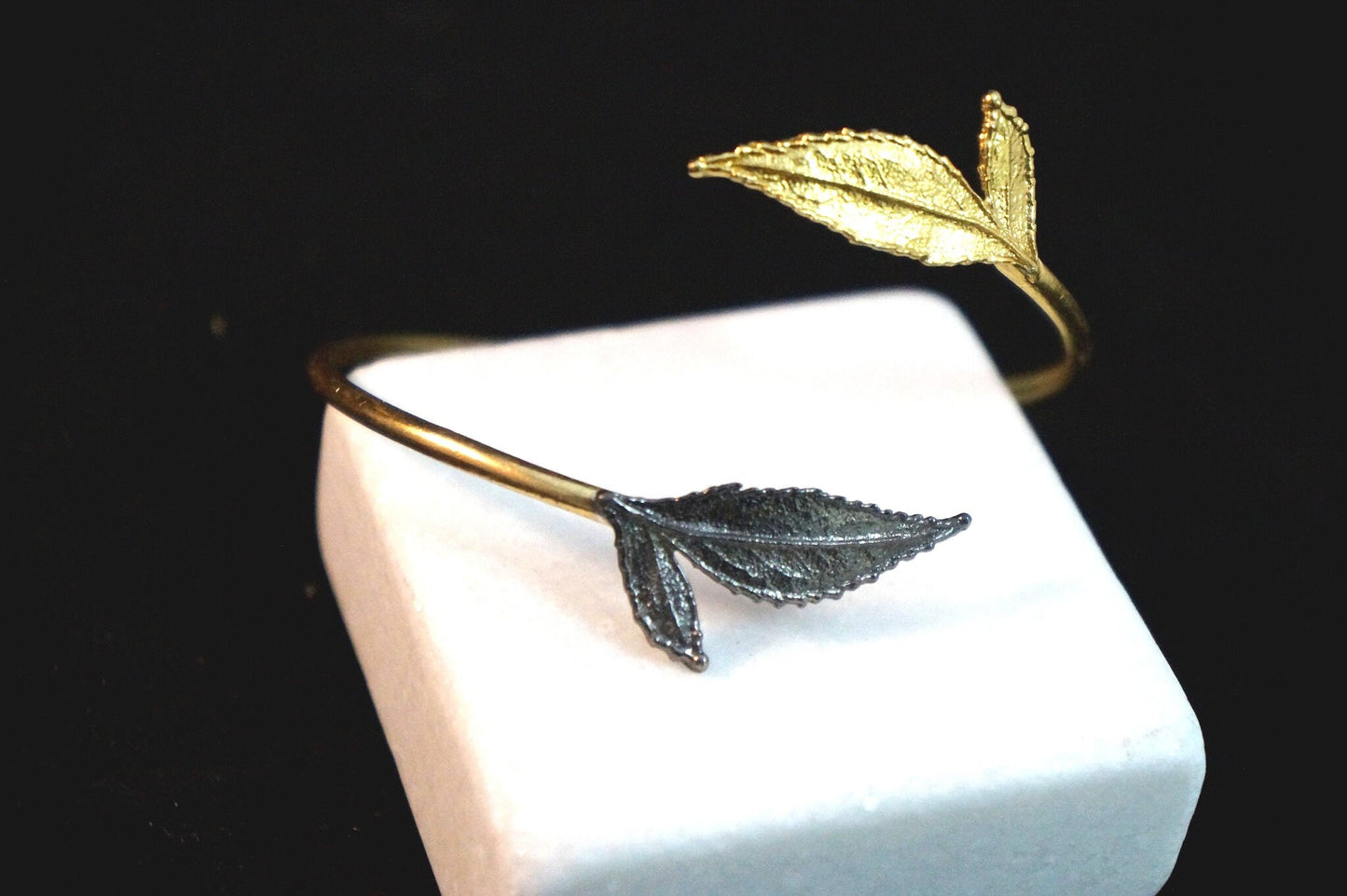 14K Gold plated and Black Rhodium on Sterling Silver leaf cuff bracelet. Roses are ancient symbols of Love and Beauty