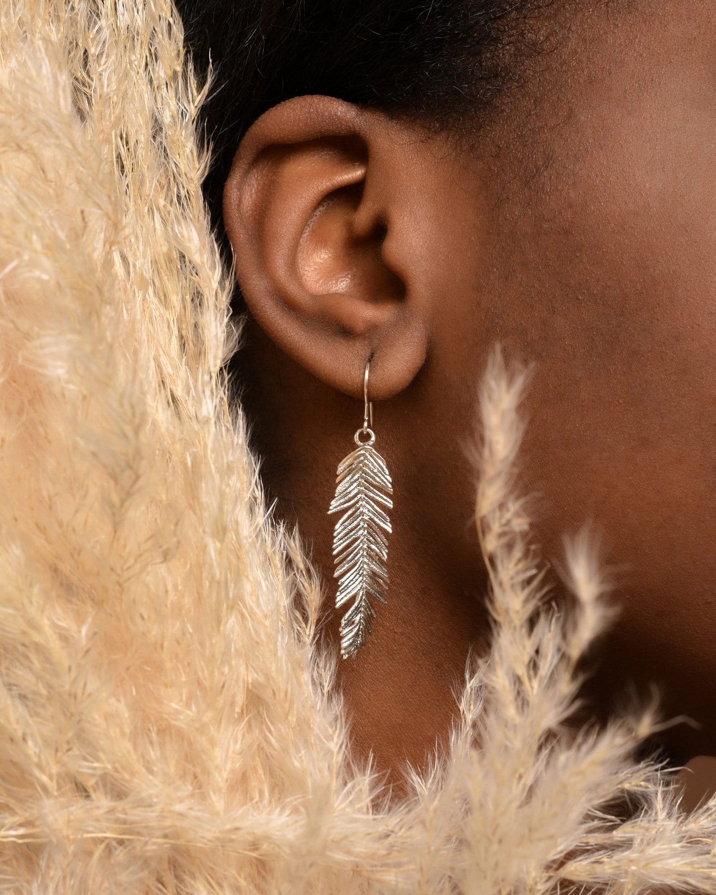 Leaf Earrings on  sterling silver mimosa pudica plant leaves.