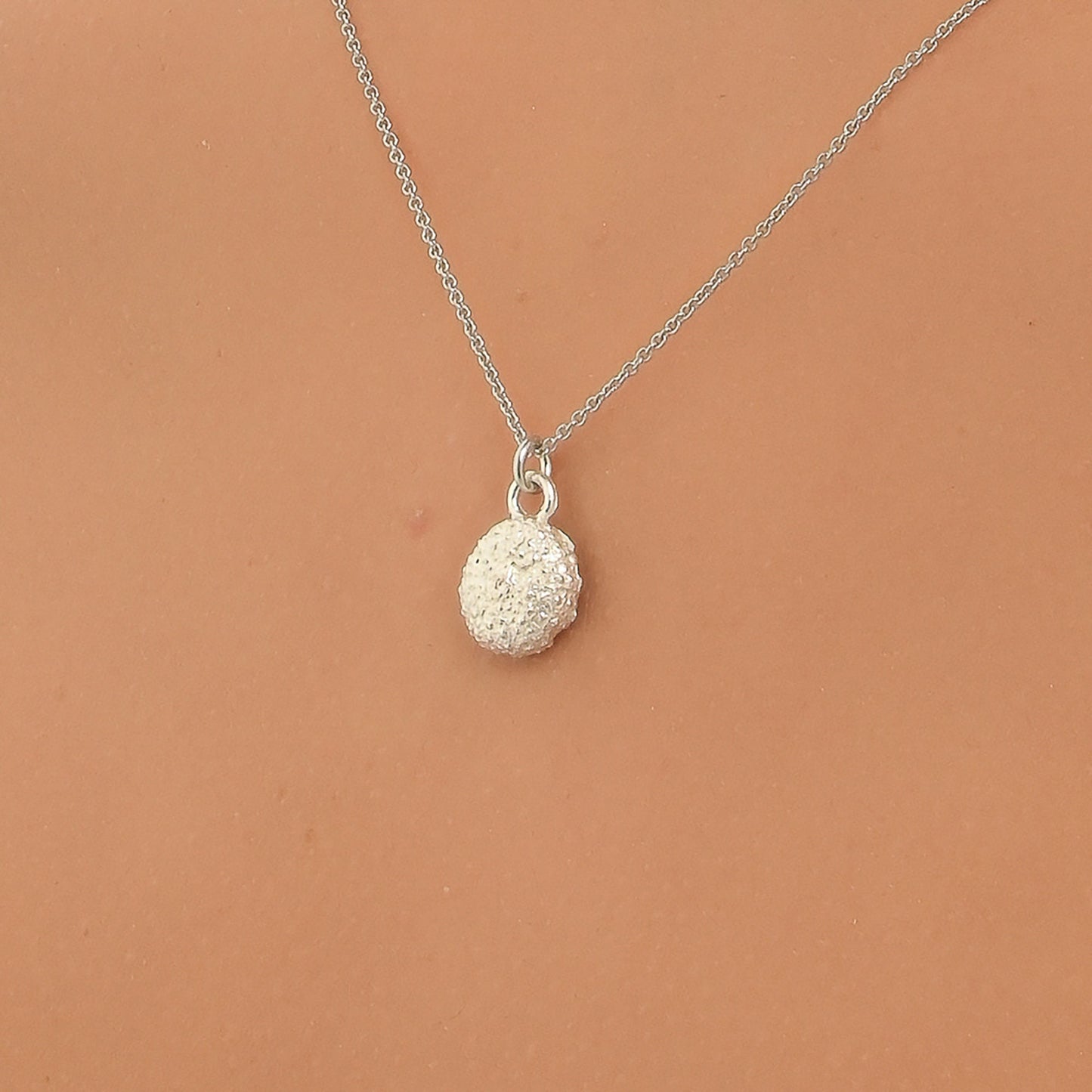 Minimalist Tiny Urchin pendant necklace for girls and women on sterling silver 925.Urchin is a symbol tenacity, Patience and Life Force.