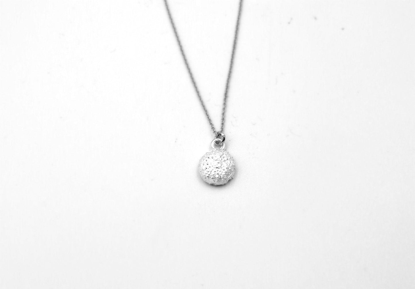 Minimalist Tiny Urchin pendant necklace for girls and women on sterling silver 925.Urchin is a symbol tenacity, Patience and Life Force.