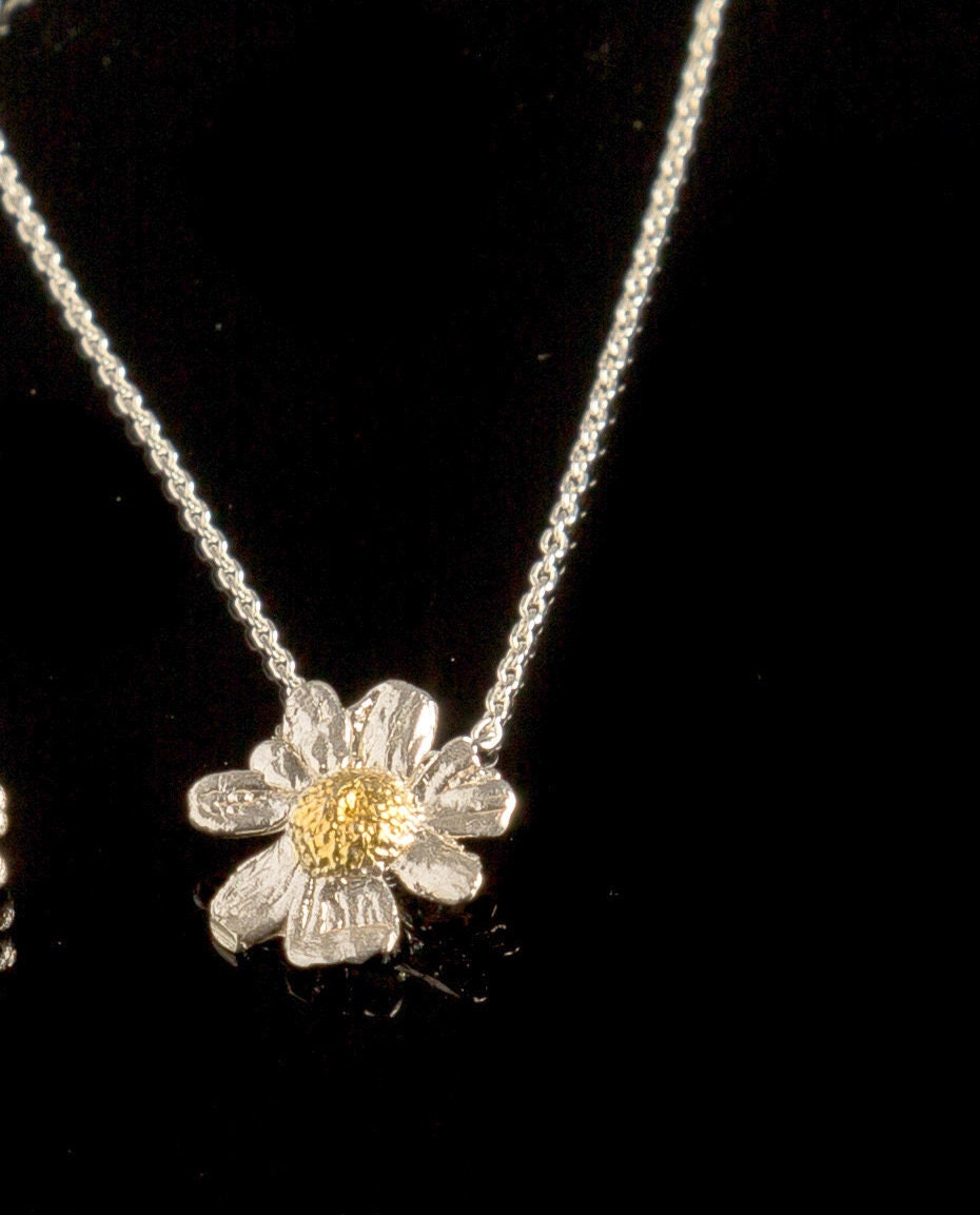 Tiny Chamomile flower charm necklace on chain. Recycled Sterling silver or 14k Gold on it by Mother Nature Jewelry.