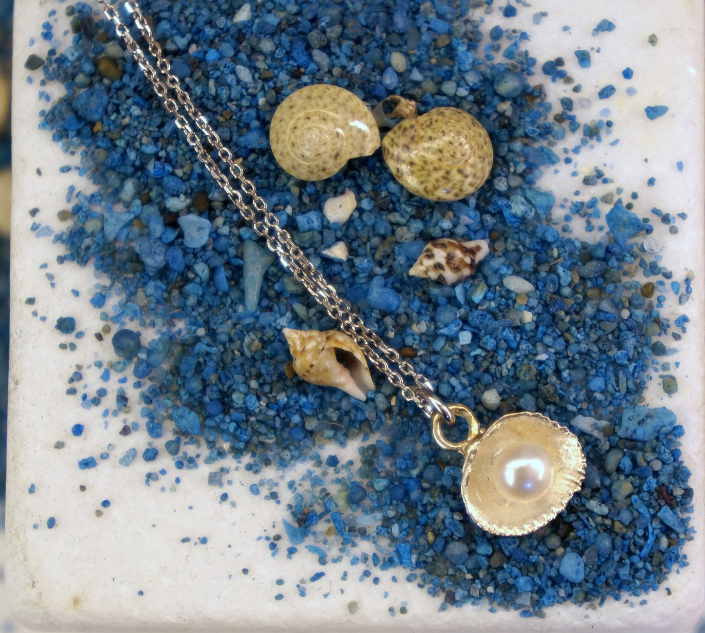 Real Sea shell sterling silver necklace with freshwater pearl.