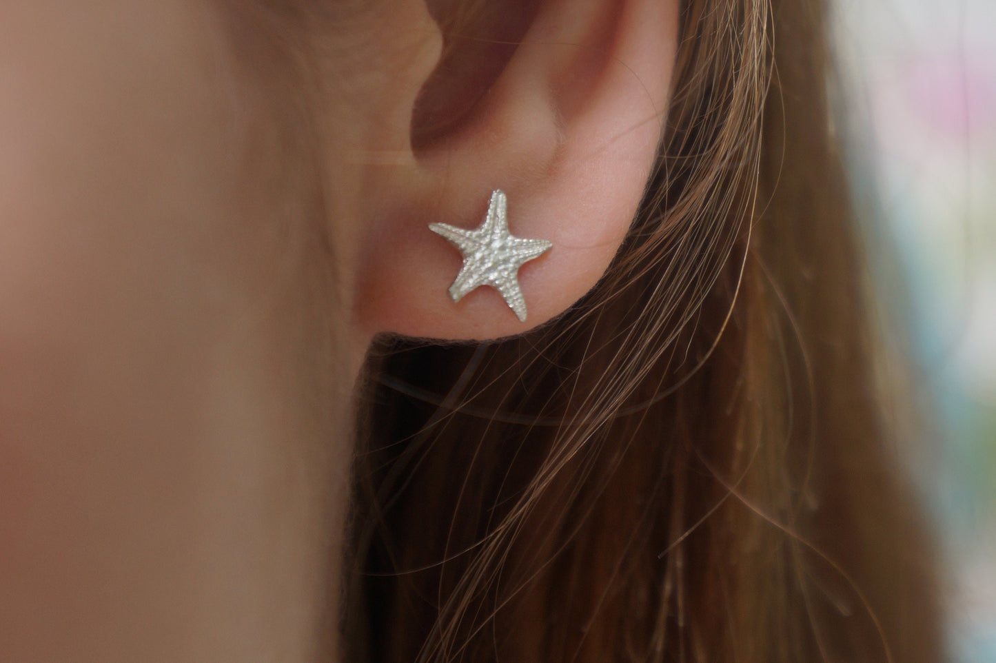 Solid gold stud earrings starfish. Star Fish symbolizes the 5 elements. Earth, Air, Water, Fire, Spirit.